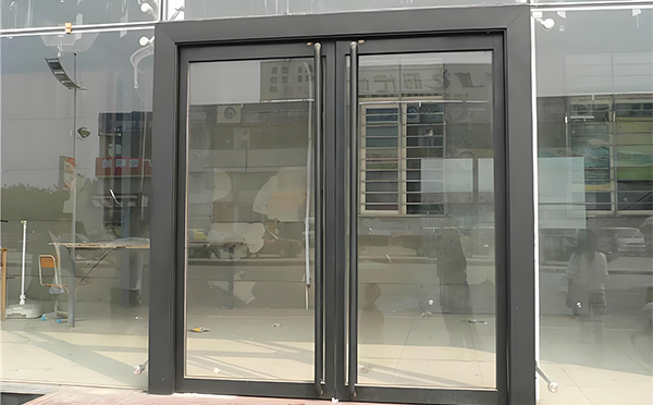 千阳玻璃地弹门